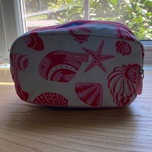 NWOT Scout makeup bag, three pockets